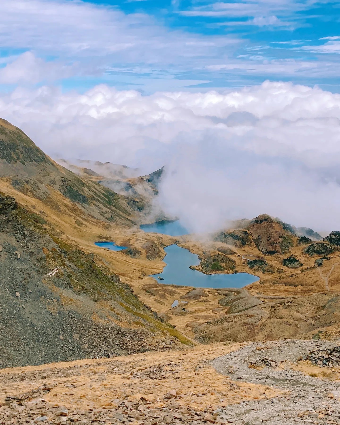Mountain landscape with lakes and clouds in the sky